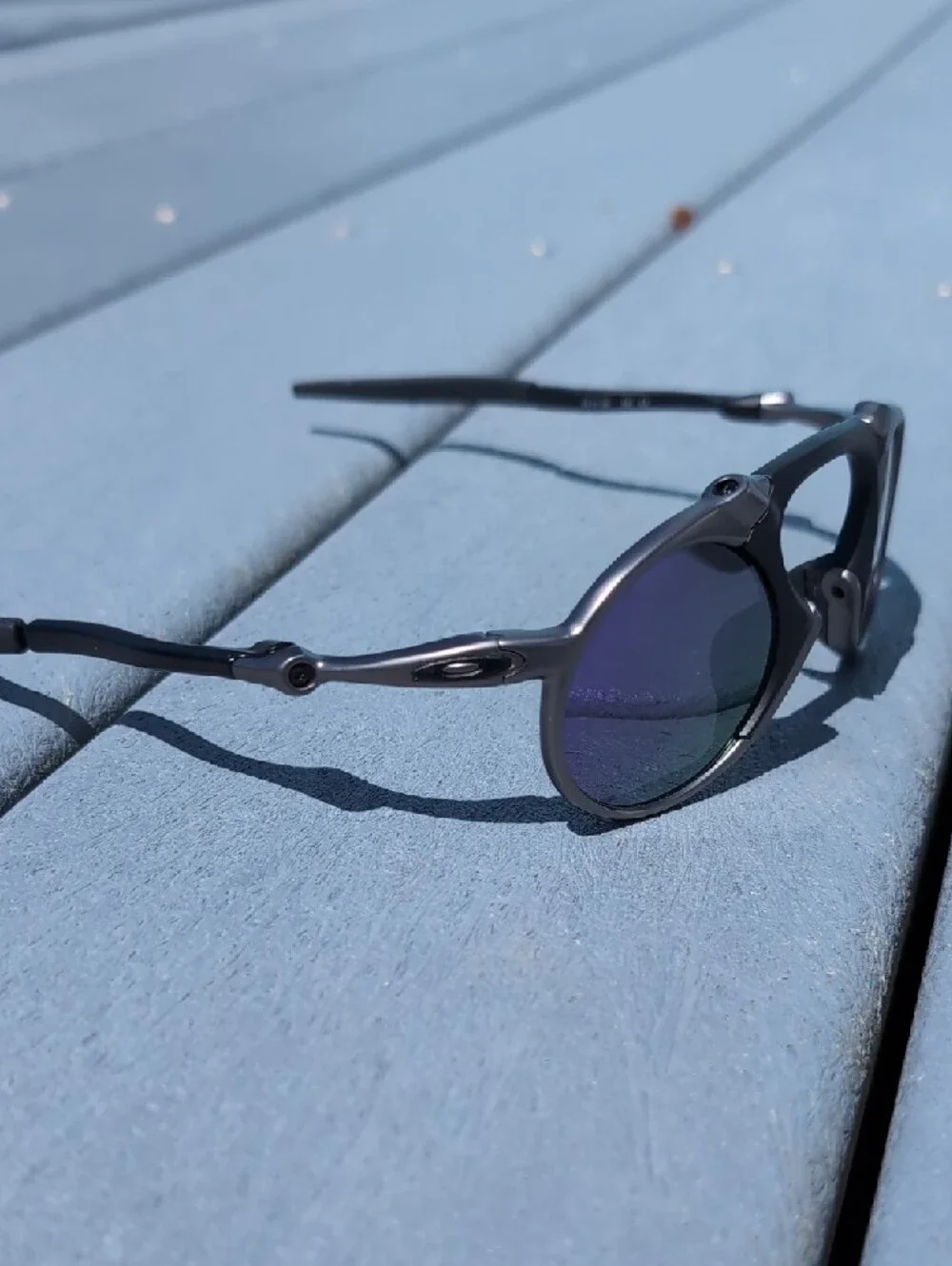 Oakley Madman Round Metal Black Silver Sunglasses with Polarized Mirrored Lenses